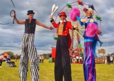 stilt walkers at company fun day